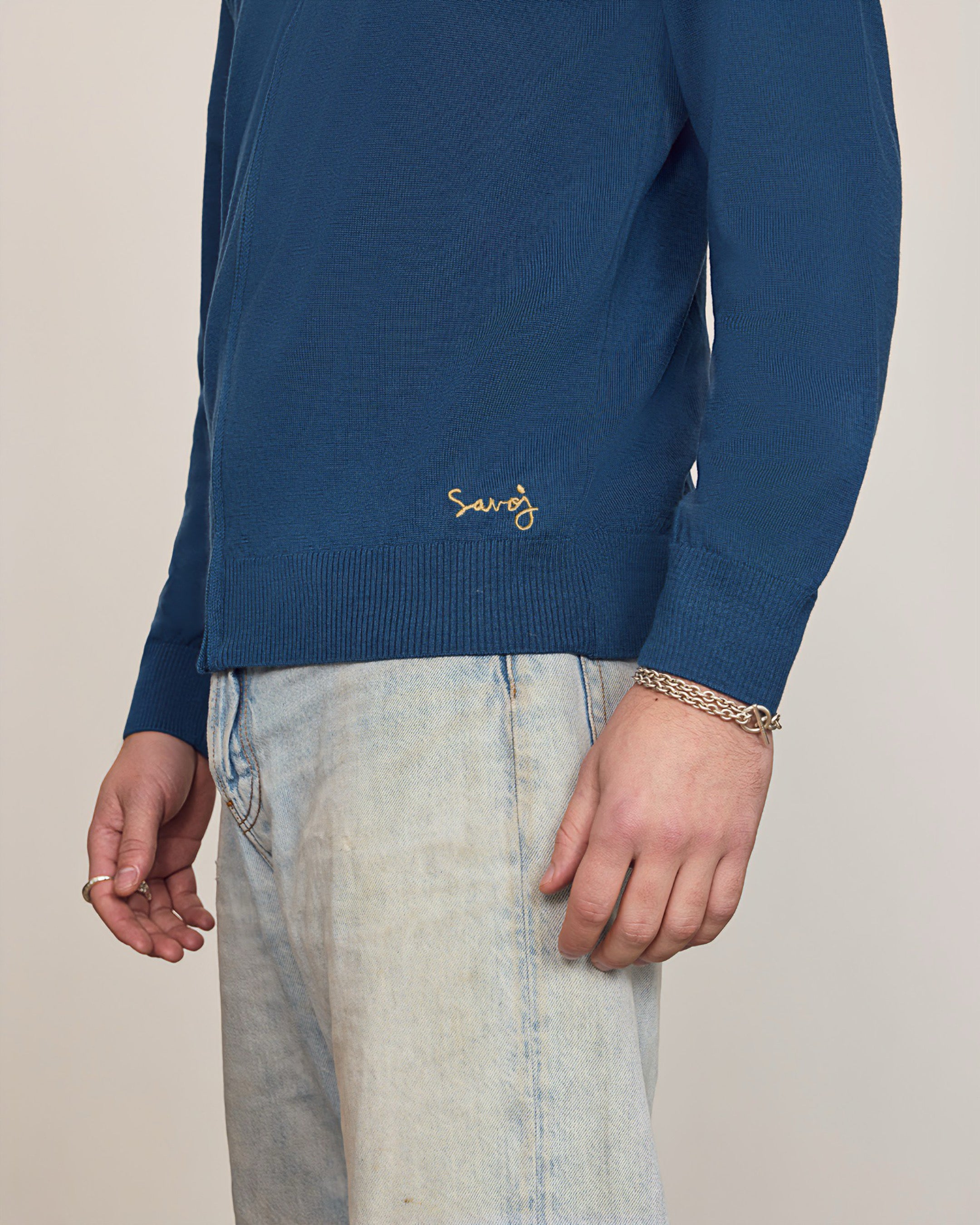 Savoj unisex merino wool cardigan side view, sleek metallic zipper