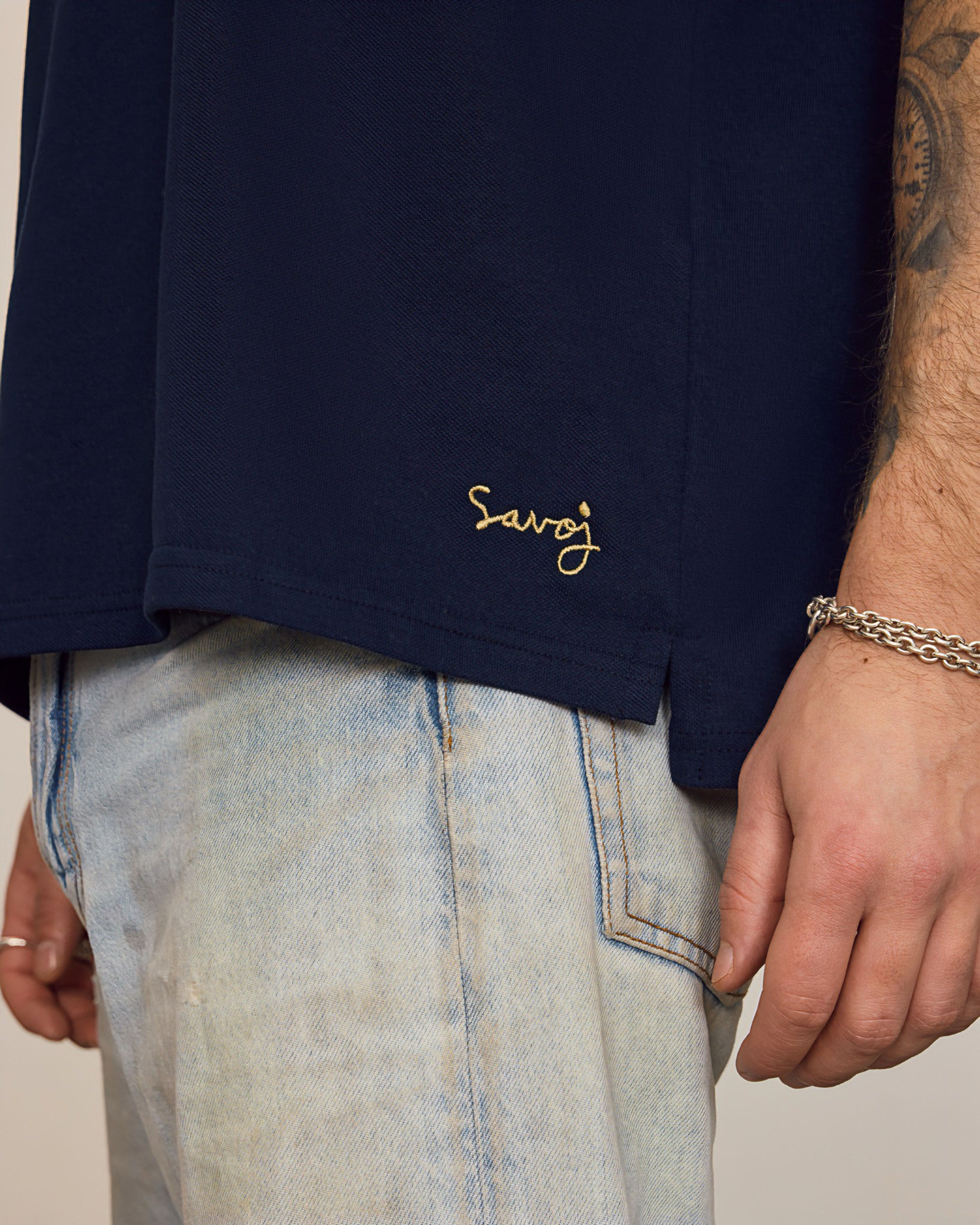 Unisex Savoj Polo – Handwriting Emblem Detail at Hem