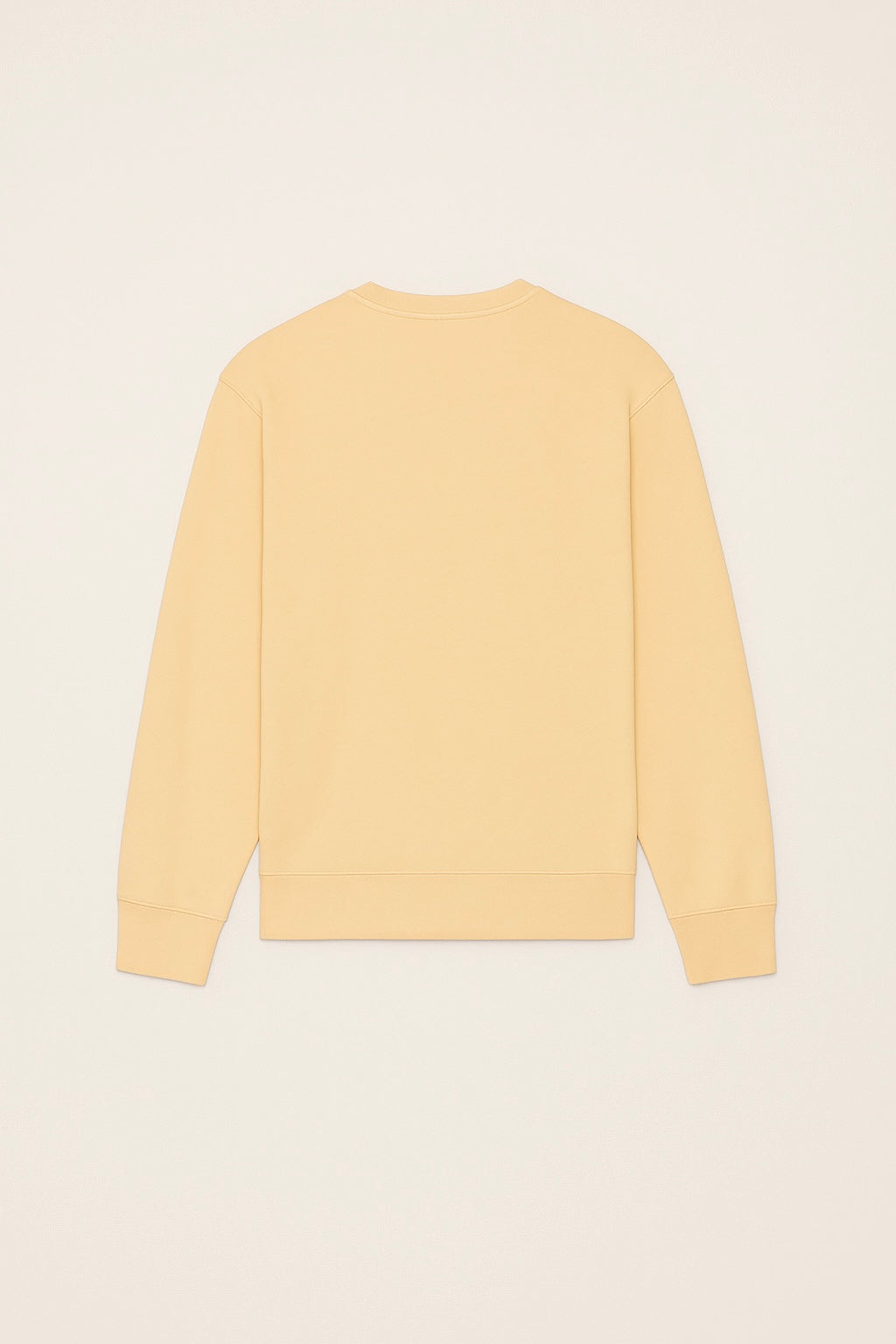 Back view of Savoj men’s emblem patch sweatshirt in soft apricot